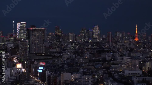 Wallpaper Mural TOKYO, JAPAN : Aerial high angle sunset CITYSCAPE of TOKYO. View of buildings and streets at central downtown area. Japanese city life and metropolis concept. Time lapse zoom in shot dusk to night. Torontodigital.ca
