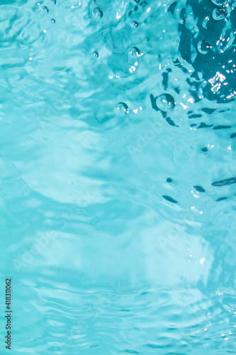 blue water background with ripples and bubbles