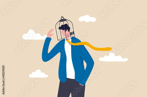 Limited understanding, creativity blocker, fear of challenge, bias or ego trapped, powerless or lack of intelligence concept, depressed businessman with birdcage lock his head.