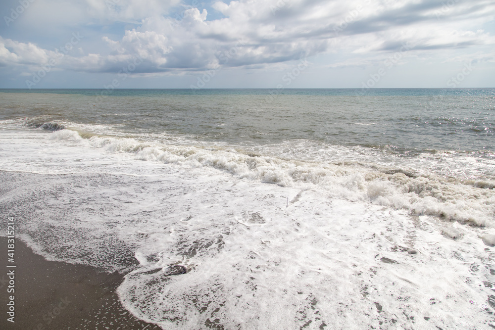 Wave on the seashore as a background. Wave on the seashore as a background.
