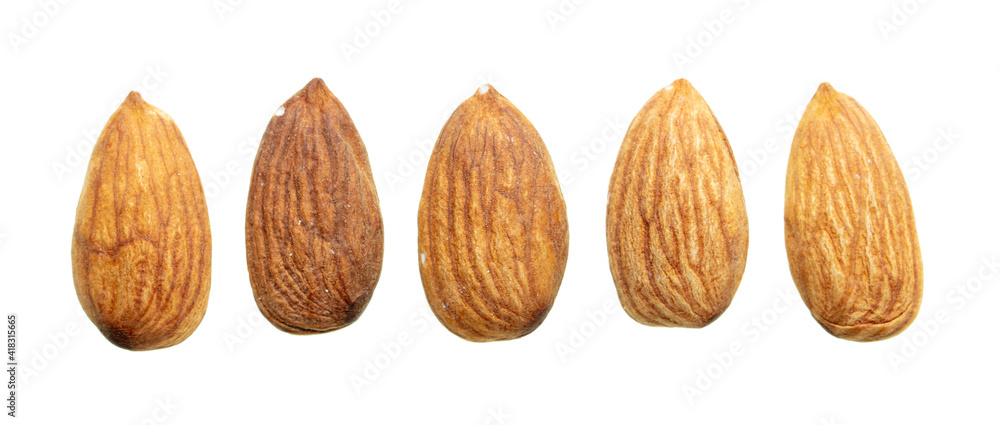 Close up of almond nuts isolated on white Close up of almond nuts isolated on white