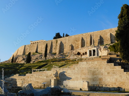 January 2019, Athens, Greece. View of the Acropolis hill south slope. The Parthenon temple, choragic monuments, the theater of Dionysus, the statue of Menander photo