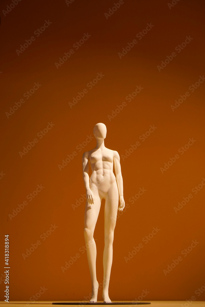 athletic women's dummy on an orange background athletic women's dummy on an orange background