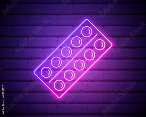Glowing neon line Pills in blister pack icon isolated on brick wall background. Medical drug package for tablet vitamin, antibiotic, aspirin. Vector Illustration