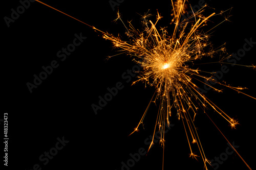 A picture of a real sparkler set against a black background