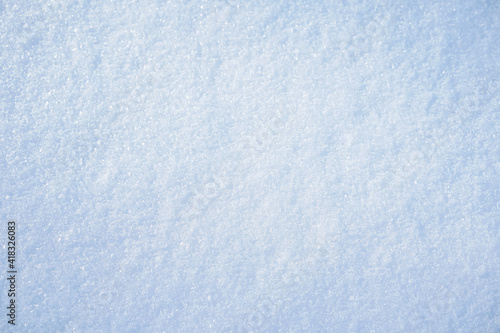 Fresh snowfall on an open field. Textured, nature pattern.