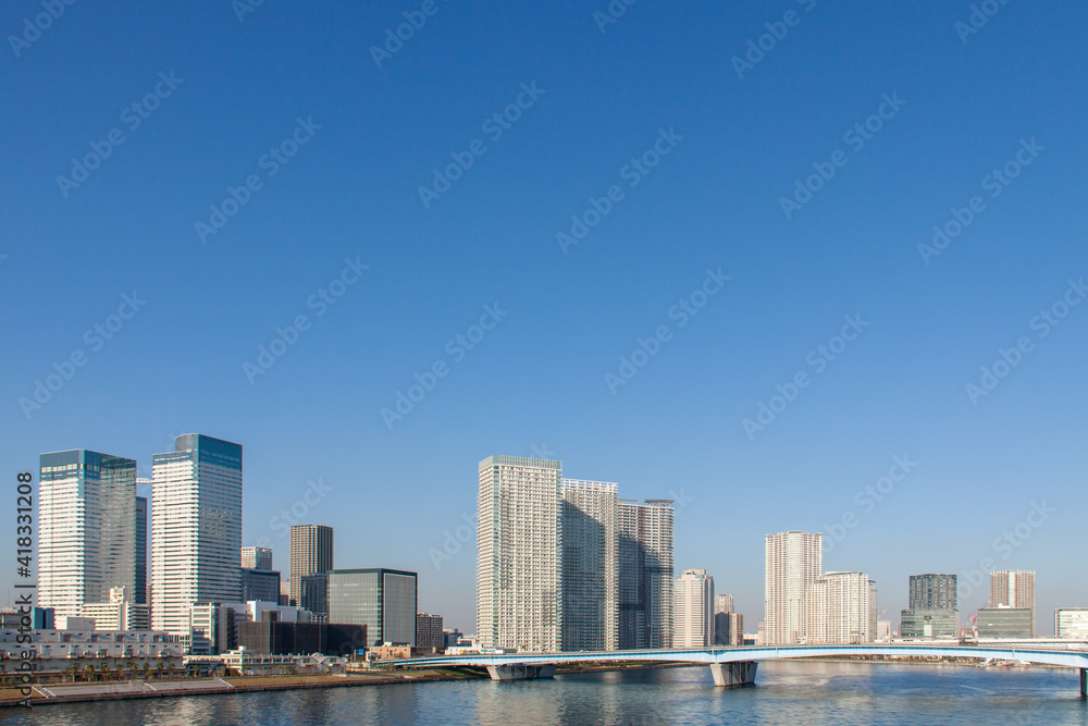 High-Rise Buildings on the Waterfront against the Blue Sky