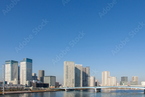High-Rise Buildings on the Waterfront against the Blue Sky © Yz-Wu