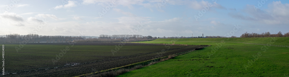 A dyke in a Dutch polder landscape