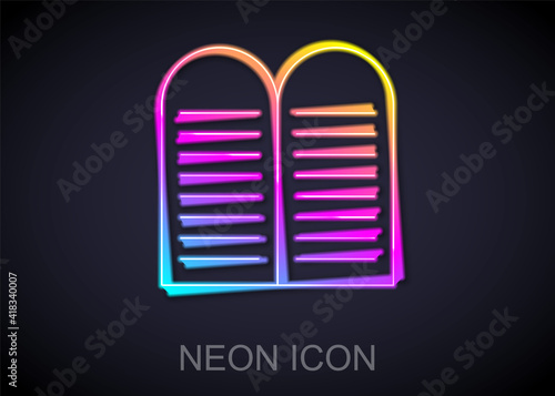 Glowing neon line The commandments icon isolated on black background. Gods law concept. Vector.