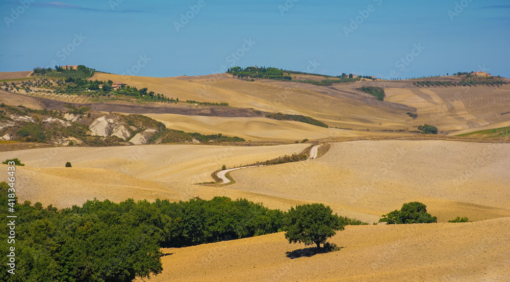 Late summer landscape in Val d'Orcia near San Quirico D'Orcia, Siena Province, Tuscany, Italy
