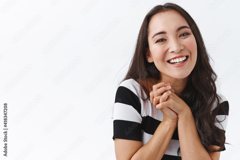 Close-up attractive, charming and feminine young laughing asian girl, clasp hands near chest, giggling and smiling broadly, gazing camera cheerful, showing positivity and optimistic emotions Close-up attractive, charming and feminine young laughing asian girl, clasp hands near chest, giggling and smiling broadly, gazing camera cheerful, showing positivity and optimistic emotions
