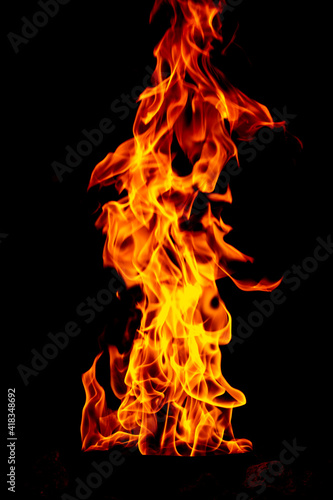 Fire flame isolated on black isolated background - Beautiful yellow, orange and red and red blaze fire flame texture style.