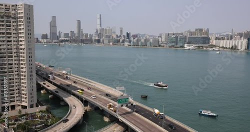 Car traffic at rush hour  on Island Eastern Corridor which is an expressway built along the northeastern shore of Hong Kong Island