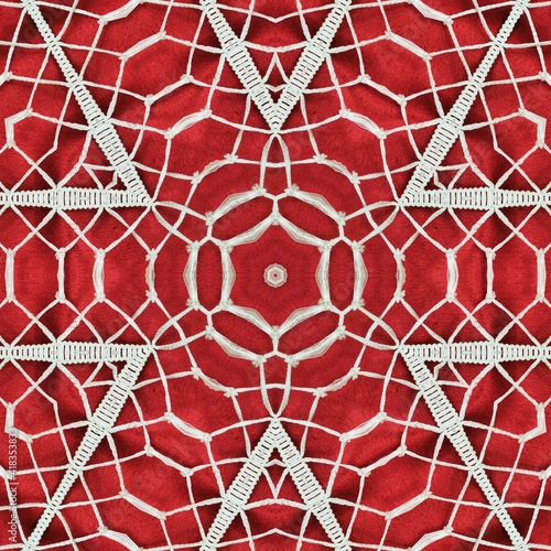 patterns and radial hexagonal designs from traditional plain dark red material with white tassel fringe 