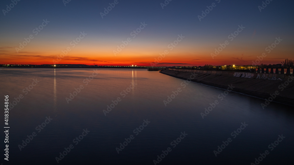 Colorful evening sky over lake during sunset