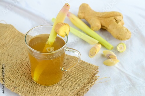 Traditional Indonesian drink, ginger lemongrass tea on white background