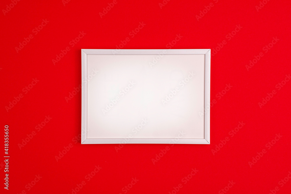 Mockup white frame flat lay on vibrant red background. Mothers day holiday presents happy birthday concept with space for your text template. Mockup white frame flat lay on vibrant red background. Mothers day holiday presents happy birthday concept with space for your text template.