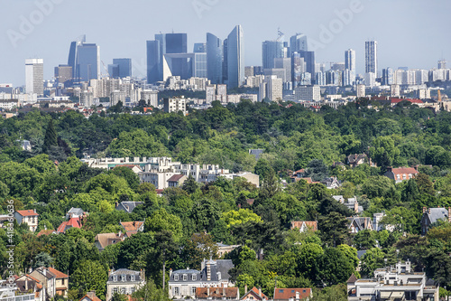 Beautiful view of valley of Seine River and panorama of Paris on backgrounds from lookout in city Saint-Germain-en-Laye (13 miles west of Paris). Saint-Germain-en-Laye, France.