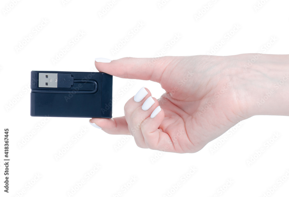 USB card reader in hand on a white background isolation USB card reader in hand on a white background isolation