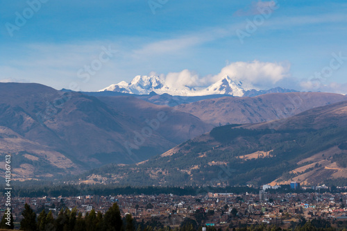 Panoramic view of the city of Huancayo at the foot of the imposing mountains and the snowy Huaytapallana. Huancayo - Peru