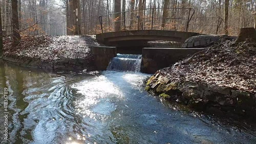 Bach mit kleinem Wasserfall im Siebentischwald Stadtwald Augsburg Zigeunerbach mündet in Siebenbrunner Bach photo