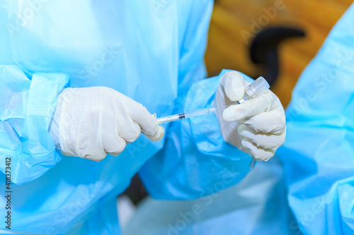 Obraz na płótnie Covid-19 vaccine, doctor with syringe w salonie