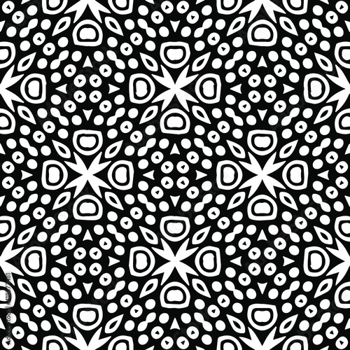 Geometric vector pattern with triangular elements. Seamless abstract ornament for wallpapers and backgrounds. Black and white patterns..
