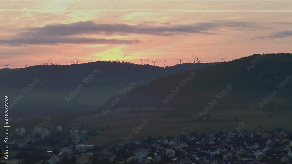 Sunset drone flight capturing German windmills Sunset drone flight capturing German windmills