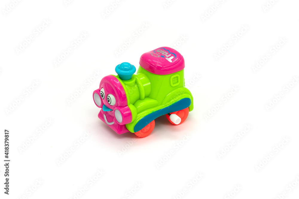 Colorful plastic train, isolated on white background. Colorful plastic train, isolated on white background.