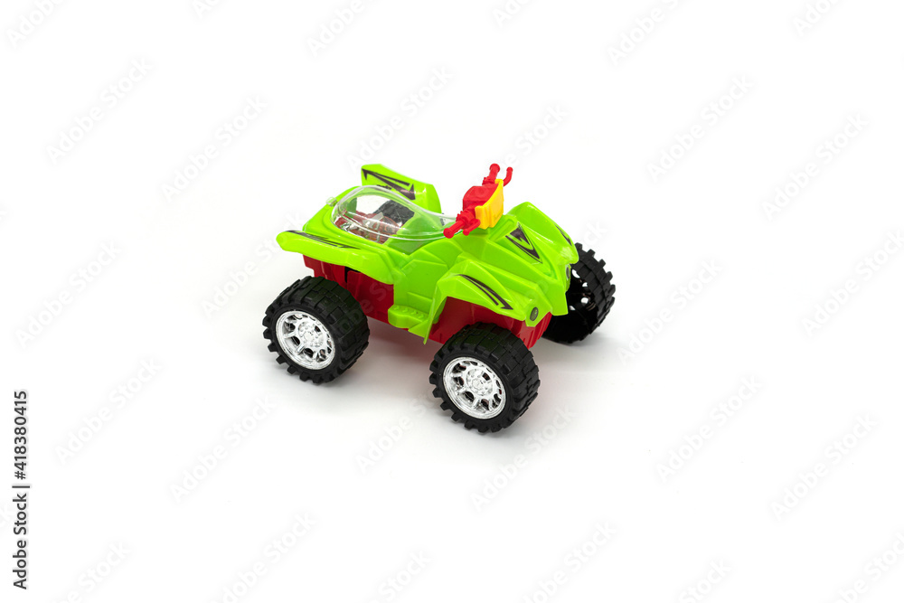 Plastic ATV toy isolated on white background. Plastic ATV toy isolated on white background.