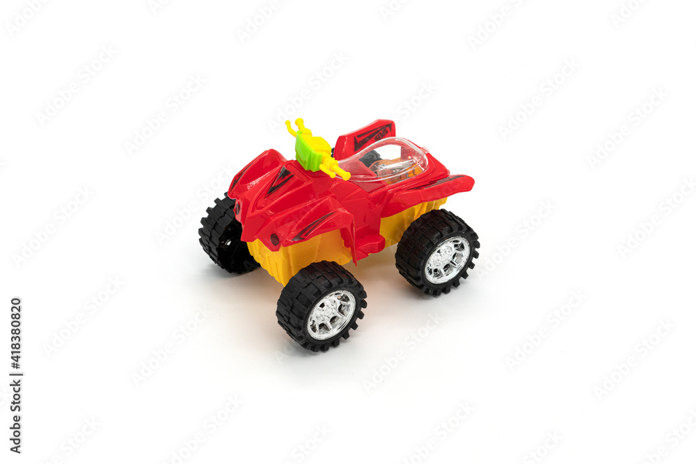 Plastic ATV toy isolated on white background. Plastic ATV toy isolated on white background.