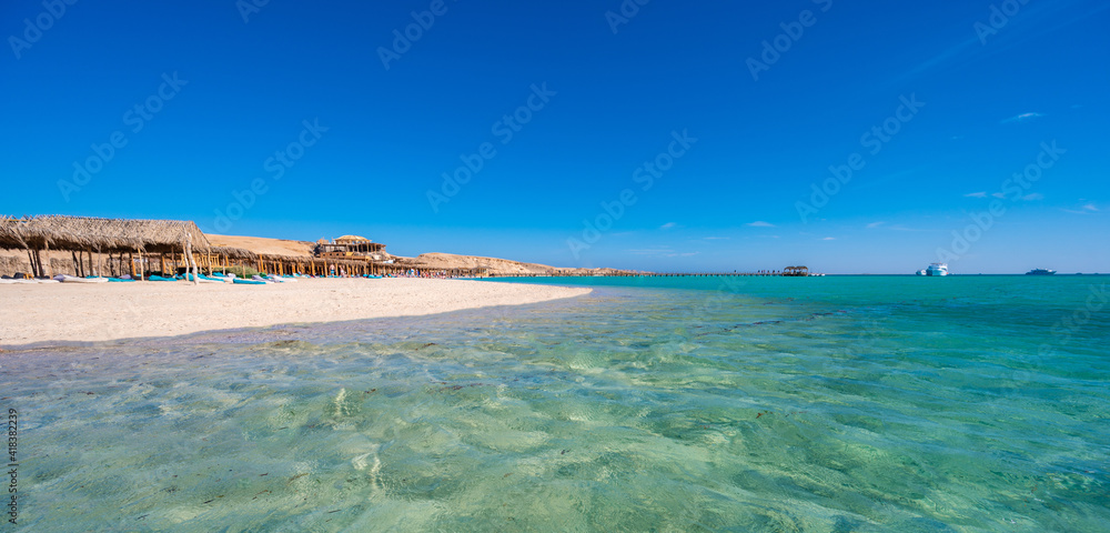Orange Bay with white beach and crystal clear azure water - paradise coastline of Giftun island, Mahmya, Hurghada, Red Sea, Egypt