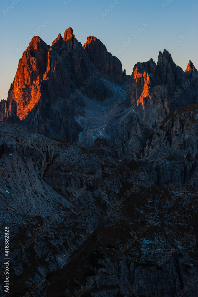 First light on mountains of Dolomites
