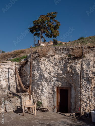 old house in a cave on sacromonte in the mountains of granada, spain