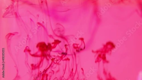 Abstract red texture, Blood in water,  liquid painting, is an amazing organic background for visual effects and motion graphics