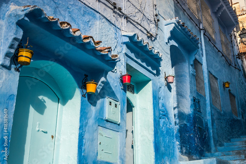 Blue painted house exteriors on stairway, detail, Chefchaouen, Morocco photo