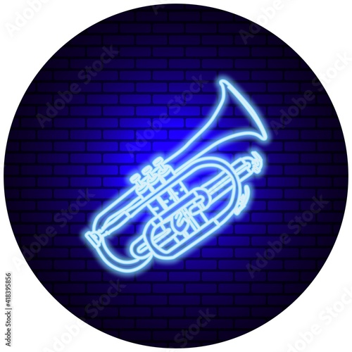 A musical trumpet in neon light against a brick wall