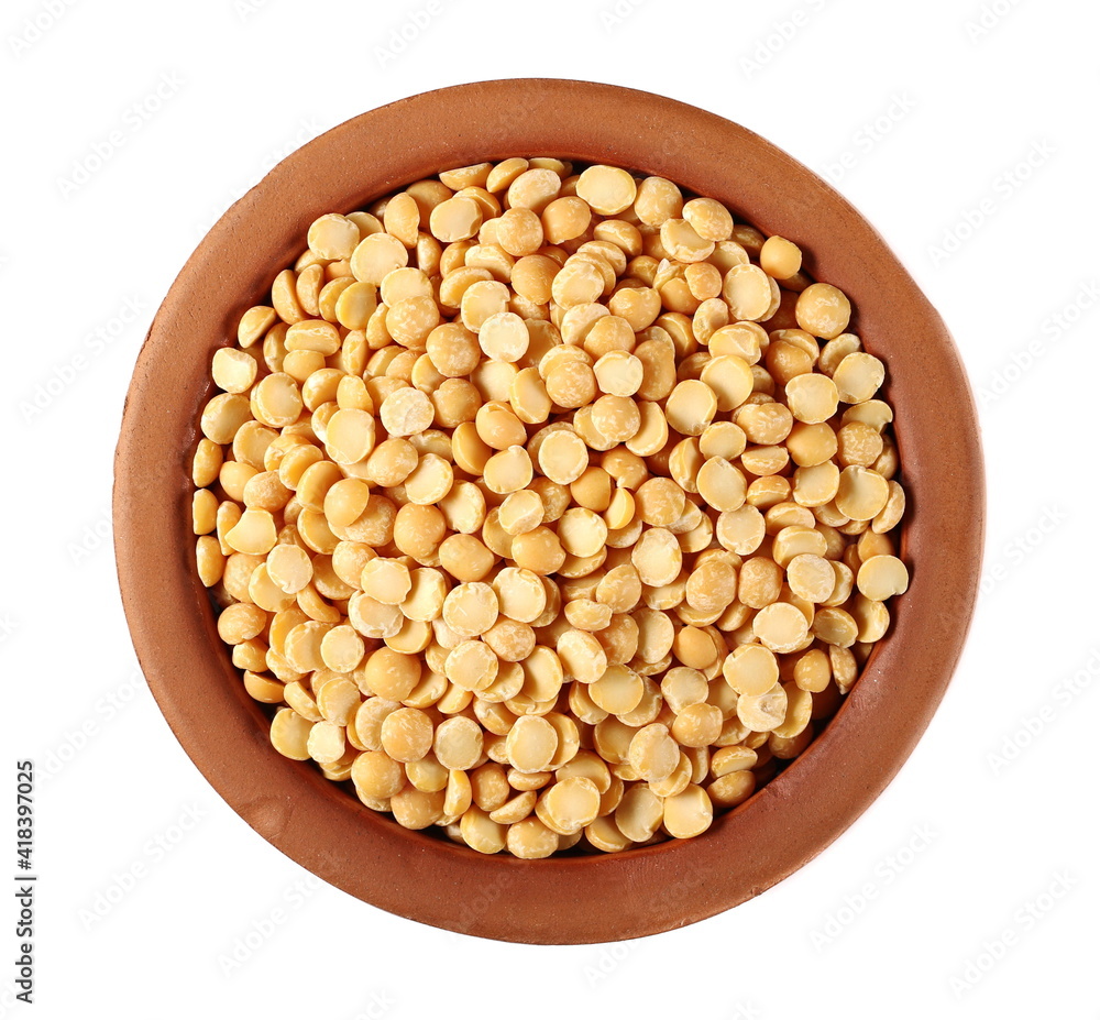 Yellow split peas in clay pot isolated on white background, top view Yellow split peas in clay pot isolated on white background, top view
