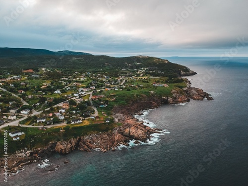 view of the coast of the sea and mountains