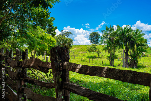 Old wooden farm fence to nature background