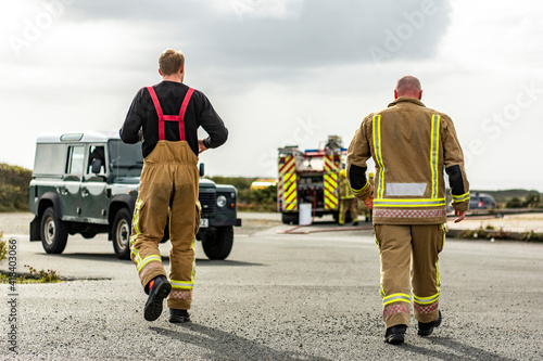 Military Airbase Fire Firefighters tackle a raging blaze on an airbase as part of military training exercises. Towering flames extinguished with the use of teamwork and specialist emergency equipment