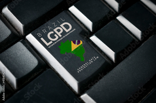 LGPD (brazilian data protection law) concept: a black computer keyboard with Brazil flag and the text Brazil LGPD lei geral de proteção de dados pessoais general data protection law photo