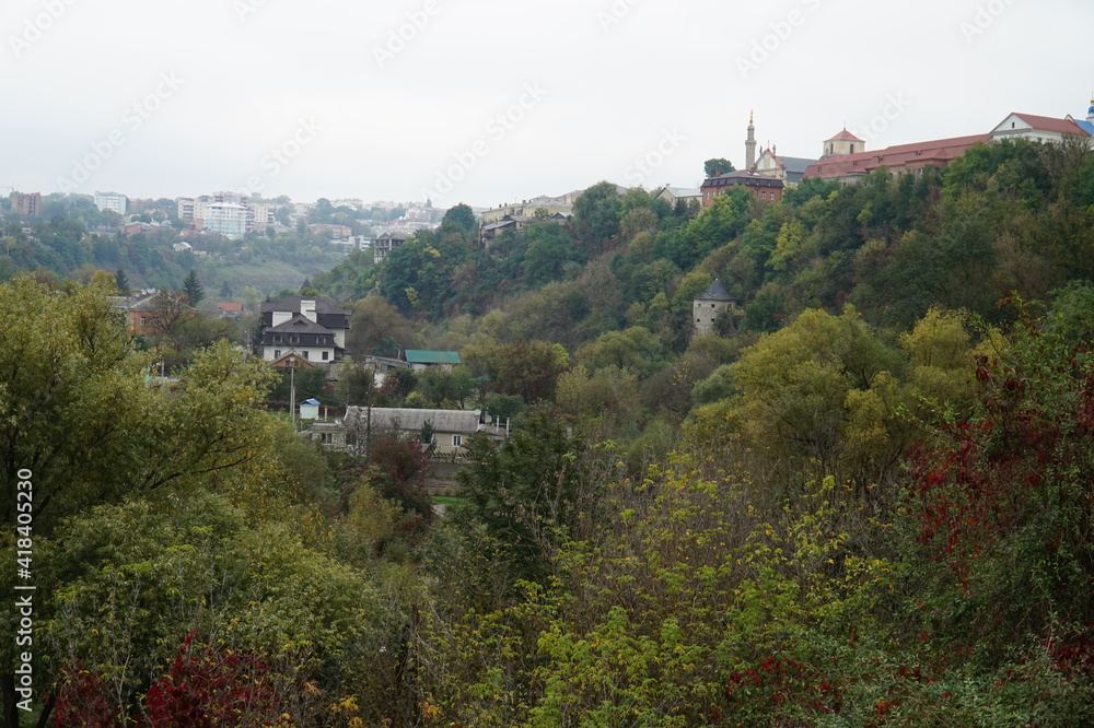 Streets with private houses in a beautiful picturesque canyon of the Smotrych River in the city of Kamenets-Podolsk