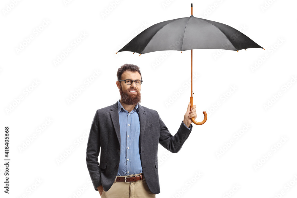 Bearded man standing and holding an open umbrella Bearded man standing and holding an open umbrella