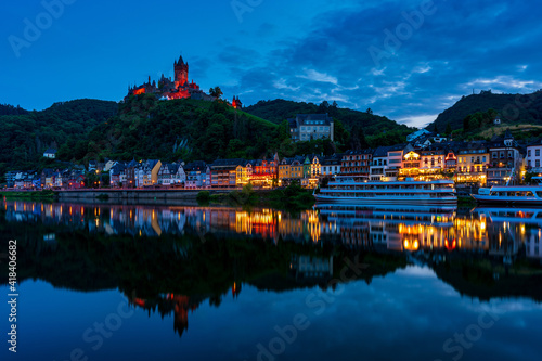 Moselle with city lights from Cochem at night, Germany..Imperial Castle of Cochem.
