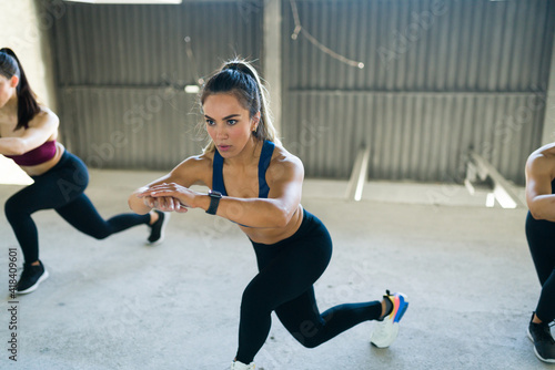 Fotografie Latin woman exercising with a cardio workout