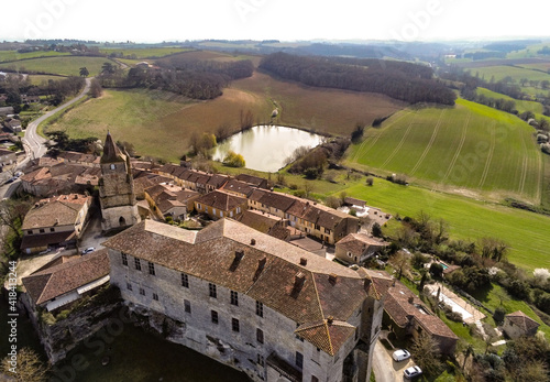 Lavardens et son chateau, aerial view of a castle and the village Gers, Occitanie, France