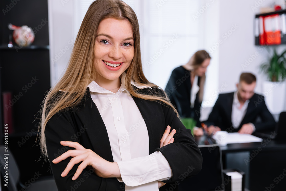Female boss, manager executive posing in a modern office, surrou Female boss, manager executive posing in a modern office, surrou