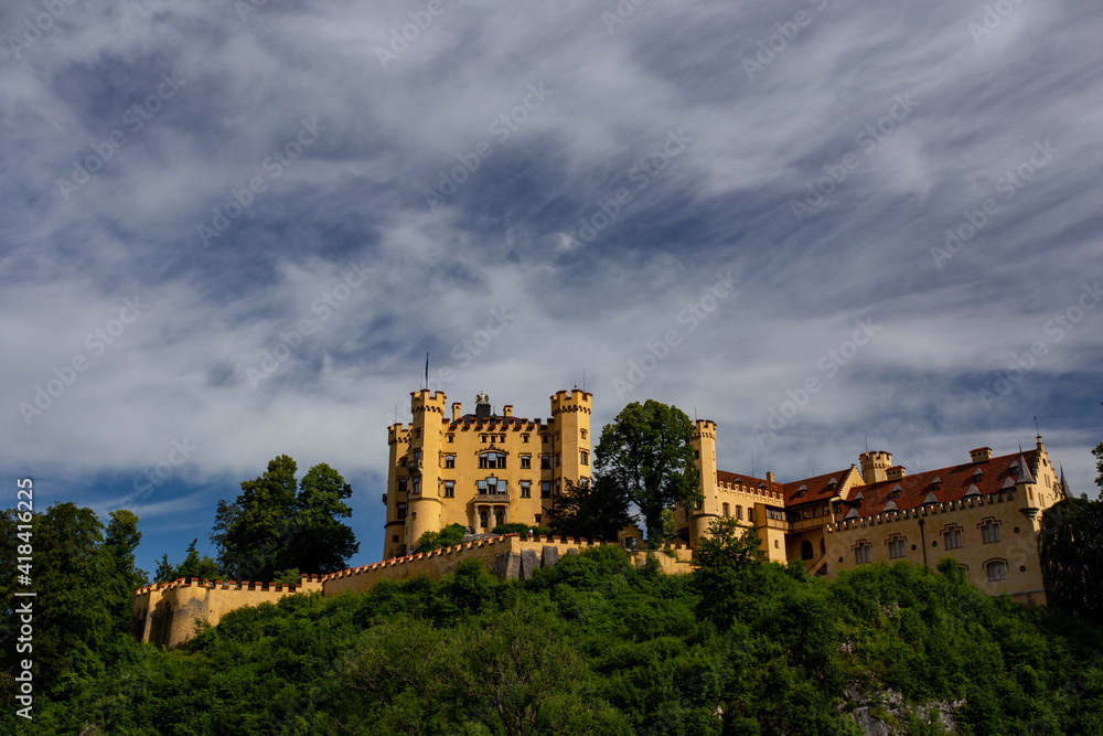 Hohenschwangau Castle is a 19th-century palace in southern Germany. It was the childhood residence of King Ludwig II of Bavaria sitting on hill opposite to neuschwanstein